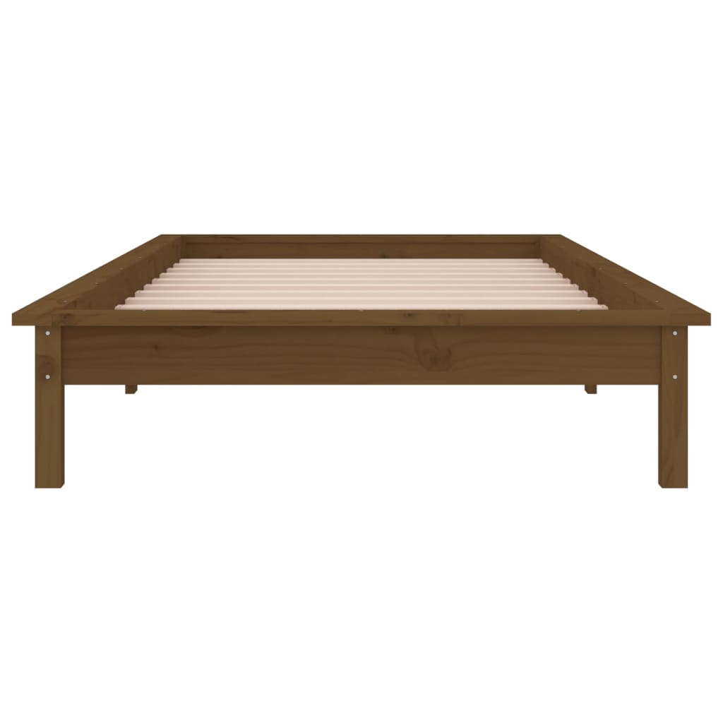 kis egyszemélyes mézbarna tömör fa LED-es ágykeret 75 x 190 cm