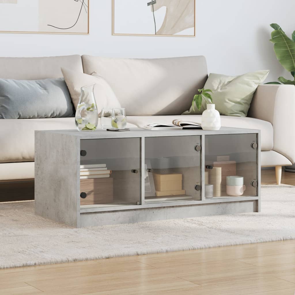 betonszürke dohányzóasztal üvegajtókkal 102 x 50 x 42 cm