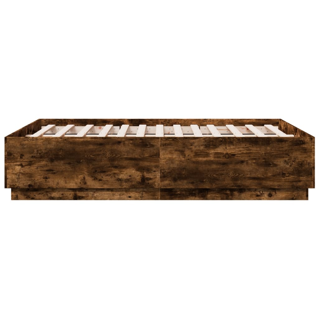füstös tölgy színű szerelt fa ágykeret LED-del 135x190 cm