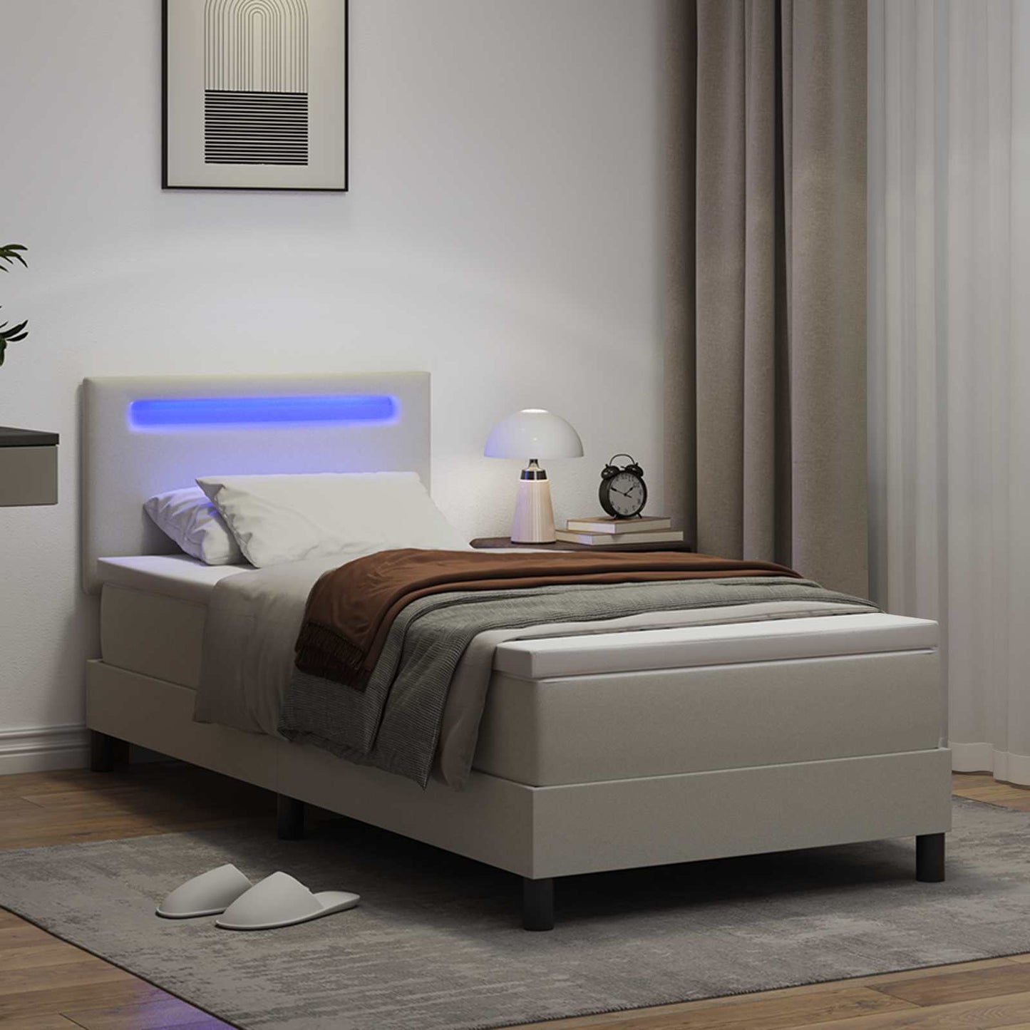 Boxrugós ágy LED szalagokkal Fehér 100 x 200 cm Műbőr