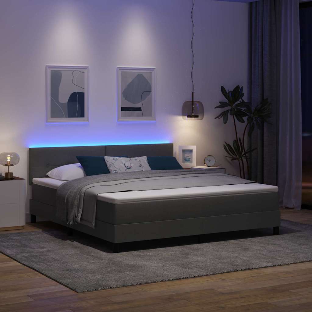 Boxrugós ágy LED szalagokkal Sötétszürke 180 x 200 cm szövet