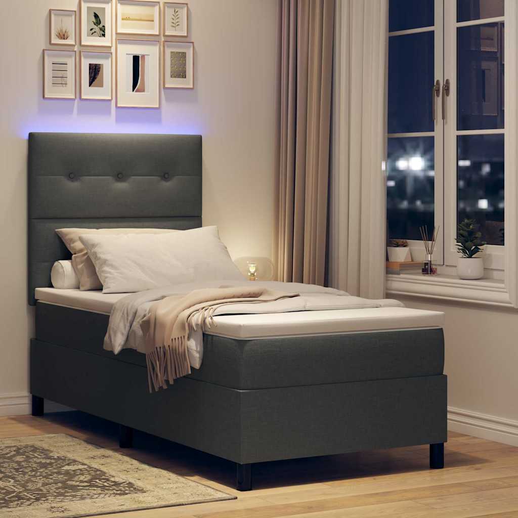 Boxrugós ágy LED szalagokkal Sötétszürke 100 x 200 cm szövet