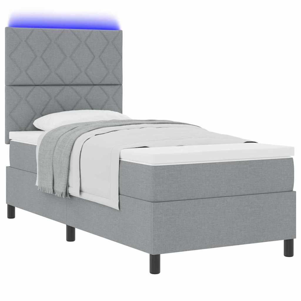 Boxrugós ágy LED szalagokkal Világosszürke 90 x 200 cm szövet