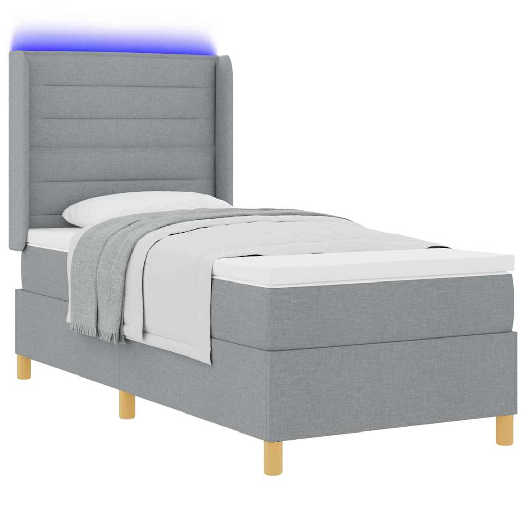 Boxrugós ágy LED szalagokkal Világosszürke 100 x 200 cm szövet