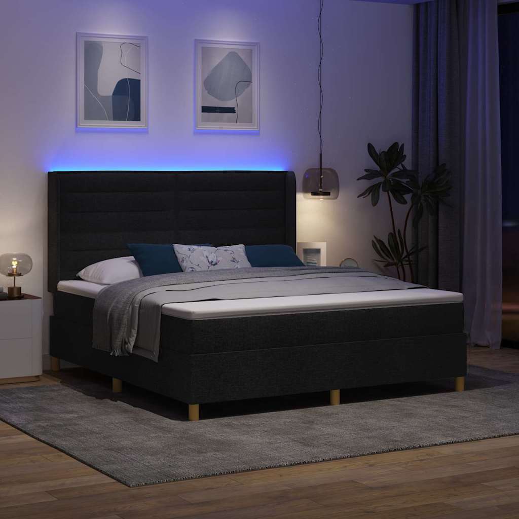 Boxrugós ágy LED szalagokkal Fekete 180 x 200 cm szövet