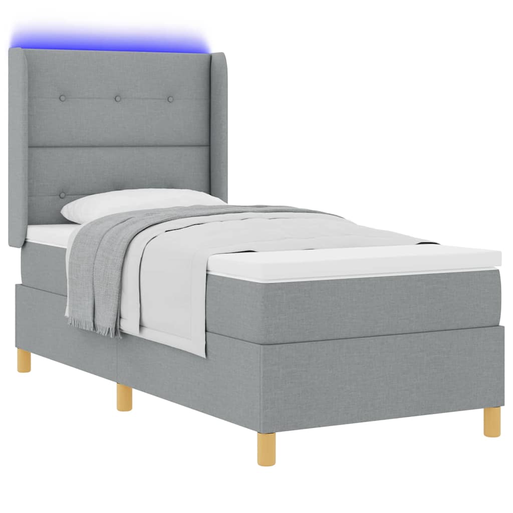Boxrugós ágy LED szalagokkal Világosszürke 80 x 200 cm szövet
