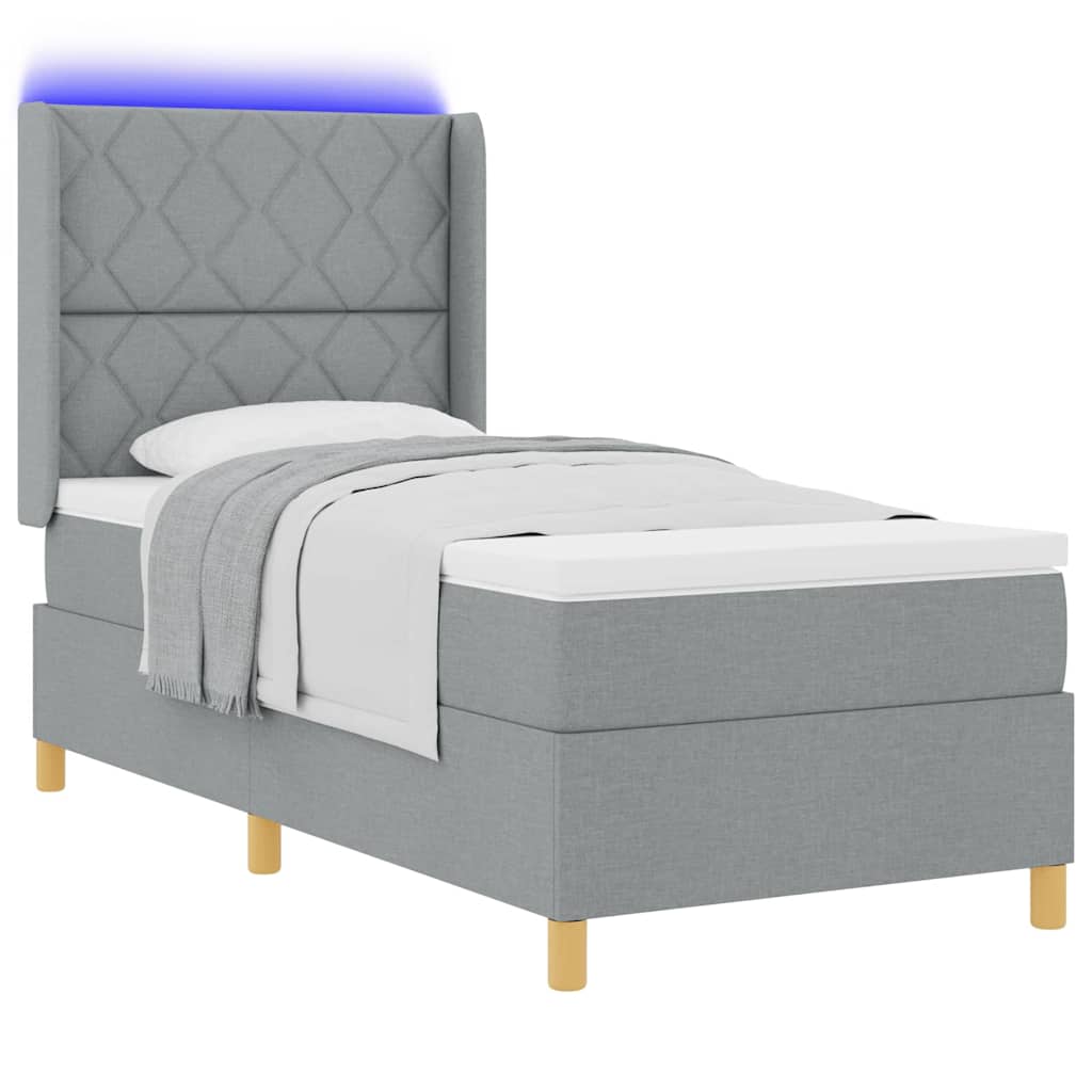 Boxrugós ágy LED szalagokkal Világosszürke 90 x 200 cm szövet